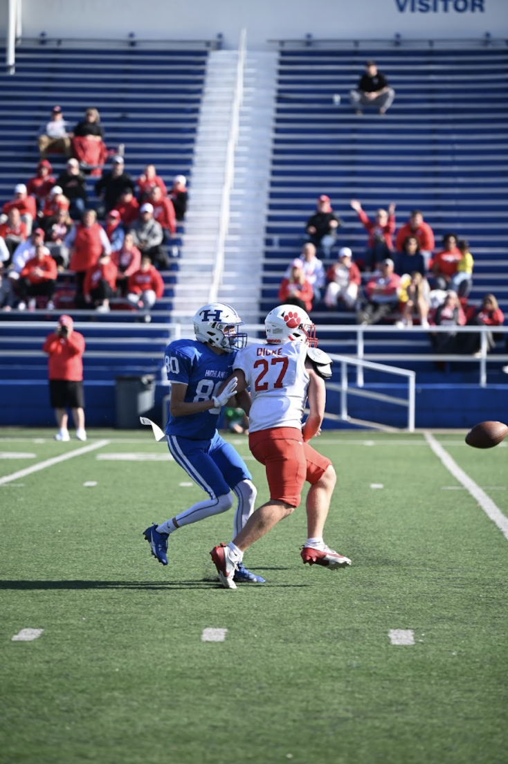 Sam Feldbruegge (10) tackles Beechwood player. 